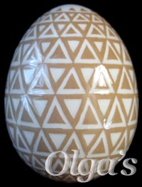 Ukrainian Easter eggs pysanky Art. Etched brown chicken eggshell. The balance.