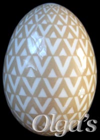 Ukrainian egg. Etched Chicken Pysanka. Tessellation of triangles variation.