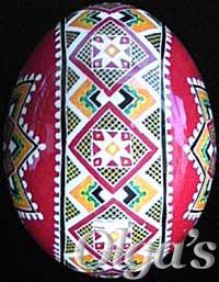 Ukrainian egg. Chicken pysanka. Red.