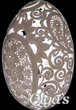Etched and carved goose egg lighted. Intricate pasley design.