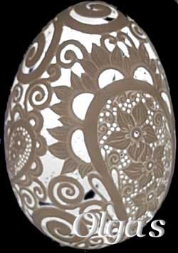 Etched and carved goose egg lighted. Lace egg.